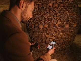 Paris: Catacombs Ticket & Audio Tour with a City Walk